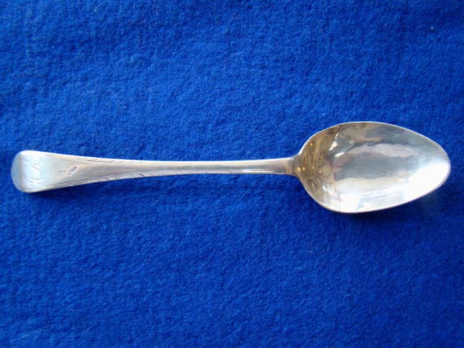 An American coin silver Teaspoon with feather edge decoration circa 1790